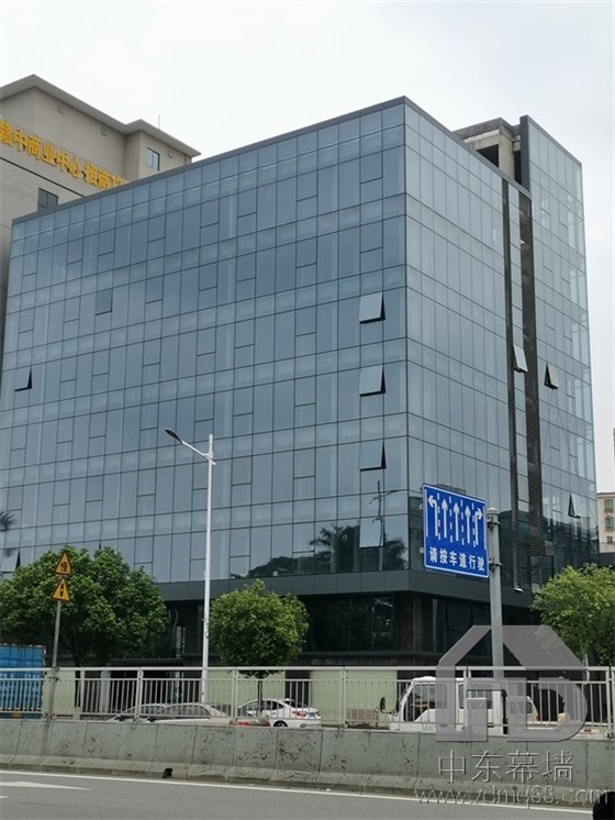 為什么現代建筑用玻璃幕墻