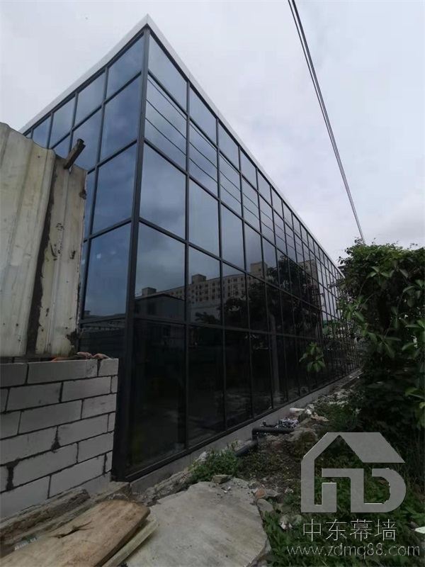 為什么現代建筑用玻璃幕墻